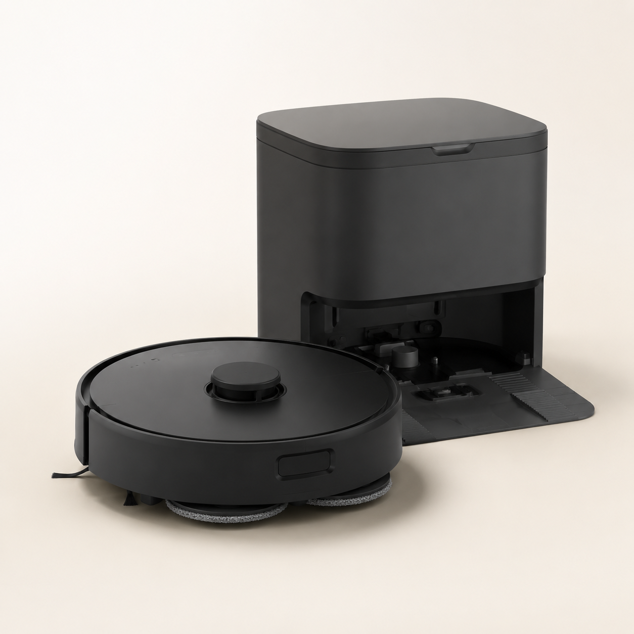 Illustration éditoriale non contractuelle d’un robot aspirateur-laveur noir avec station multifonction, évoquant l’iRobot Roomba Plus 415 Combo avec AutoWash.